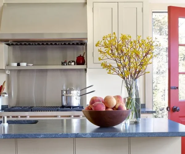 A photo of a kitchen with granite countertops.